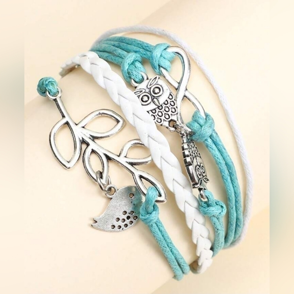 NWOT, Light Blue Braided Rope Charm Bracelet Infinity Bird Owl & Leaf Multilayer